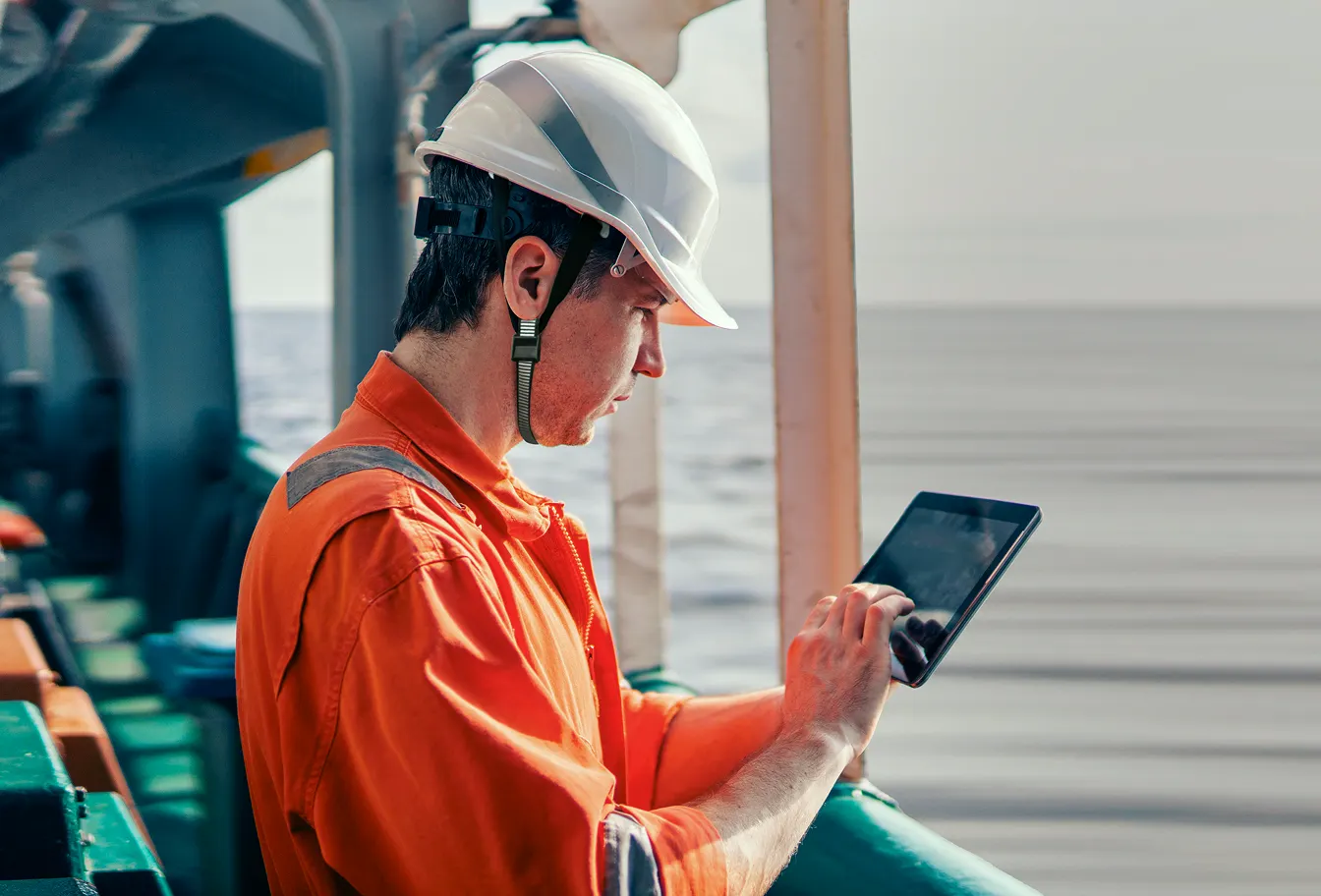 Man looking a data on a tablet